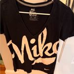 Nike Women's Black and White Graphic Tee Photo 0
