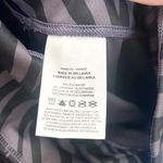 Nike  Zebra Striped Cropped Women’s Black And Grayish Purple Leggings Photo 3