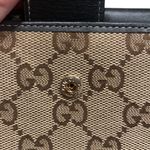 Gucci •  gold heart canvas and leather bifold wallet Photo 2