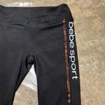  Sport black leggings 
Bebe Logo on the sides 
Size XL
Like new condition Photo 1