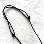 Hematite nail stake cross on cord Gray Photo 3