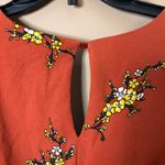 Francesca's Francesca’s Miami Floral Long Sleeve Faux Wrap Jumpsuit Orange Medium Photo 8