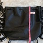 Victoria's Secret NWT Victoria’s Secret faux leather fringe backpack drawstring bag Photo 10