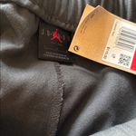 Jordan NWT $110  Women's Woven Pants Zip Cuff Large Photo 11