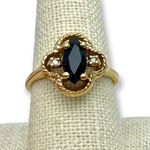 Vintage LIND Black Spinel & Diamond Gold Cocktail Ring with a quatrefoil setting Photo 0