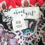 About A Girl XS Jr’s Island Print Boho Romper with a keyhole front Tie Photo 6