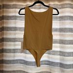 Aura ‎ Nude Bodysuit Size M/L Photo 1