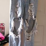 American Eagle  Outfitters mom jean ripped distressed denim in light wash blue size 2. Photo 0