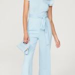 AREA STARS Light Blue Ruffle Sleeve V Photo 1