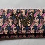 Sandoner Magenta Wallet with Sand Doll Face Design Pink Photo 0