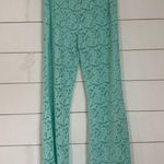 Free People NWOT All Day Lace Women’s Sheer Flare Coquette Pants Sz M Photo 3