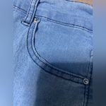 None Lightweight Women’s blue jeans, flared leg with tie details, size large Photo 8