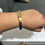 Michael Kors 2 bracelets Gold Black and Blue Photo 2
