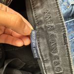 American Eagle black next level stretch ripped skinny jeans Photo 6