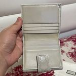 Gucci  Embossed  Leather Compact Wallet Photo 9