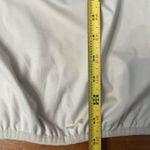 New Balance Women's Cream Hooded Running Windbreaker Jacket with Pocket Size XL Photo 4