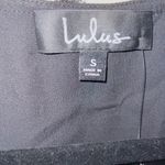 Lulus NWT Frill Factor Black Dotted Long Sleeve Surplice Romper Photo 5