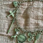 Silver Charm Bracelet with Unique Pendants Photo 2