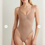 SKIMS SEAMLESS THONG BODYSUIT Photo 1