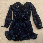 Japna NWOT Revolve  Blue Floral splice ruffle hem Romper. Size Small Photo 5