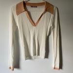 white long sleeve collared top Photo 0