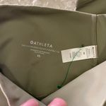 Athleta Salutation Stash Pocket II Cutout 7/8 Tight Mountain Olive XS NWT Photo 3