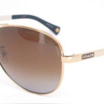 Coach  Stefanie Gold & Brown Aviator Polarized Sunglasses Photo 0