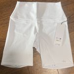Alo Yoga NWT  Women's White Bike Shorts 7” size small and Medium Photo 5