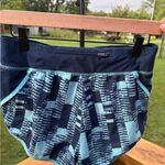 Under Armour  Women's Teal and Navy Athletic Shorts Photo 2