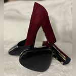 Pour La Victoire Pour lanVictoire These suede shoes shine with metal detailing on each heel Photo 1