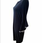 Nik And Nash  Size Medium Black With White Trim Trumpet Sleeve Dress. Photo 1