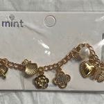 Mint Gold Charm Bracelet with Heart and Shell Photo 0