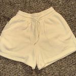 White Fox Boutique  yellow shorts, size XS, but they fit oversized Photo 1
