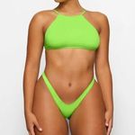 SKIMS Signature Swim High Neck Top - Neon Green, Small, $48 Photo 0