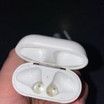 Apple AirPods And Charging Case Photo 3