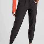 Athleta  Headlands Hybrid Trek Jogger Black Pants 6 Tall Photo 0