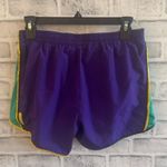 Nike Women’s Dri-fit  Livestrong lined athletic shorts purple/green/yellow Small Photo 1
