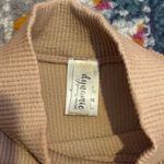 Dynamic  sleeveless turtleneck top Photo 1