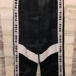 PINK - Victoria's Secret Victoria's Secret PINK camo track pants sweatpants size XS Black camo sweatpants Photo 0