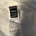 SheIn White deep V shorts romper Photo 3