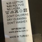 Stylish Black and White Polka Dot Midi Dress Photo 4