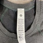 Lululemon Swiftly Tech Short-Sleeve Shirt 2.0
Hip Length - Spandex Black & White Stripe Photo 2