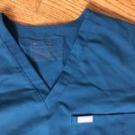 FIGS  Teal Green V-Neck Scrub Top Photo 1