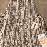 White And Tan Patterned Romper Photo 0