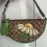 Coach Brown and Green Floral Daisy Coin Charm Photo 0
