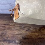 Dooney & Bourke Dooney Bourke Small DB Tassel Zip Top Tote Sand Tan Canvas Saddle Tan Leather Photo 4