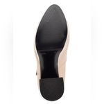 Guess Women's Callyna Platform Round Toe Mary Janes Pump Nude Beige Size 8.5 NEW New with tag Same day shipping Smoke and pets free Slay your elegant look wearing the Callyna platform pump making accent to any ensemble. Patent synthetic upper Adjustable double buckle straps closure Round toe Synthetic lining 4” heels, 1.5" platform, 5.5" covered block heel Synthetic sole Elevate your shoe game with these Women's Callyna Platform Round Toe Mary Janes Pumps in Nude Beige. These patent leather pumps boast an ultra-high block heel and a platform sole, providing both style and comfort. The round toe and adjustable buckle strap make for a perfect fit, while the ivory color and solid pattern make them versatile for any occasion. These women's size 8.5 heels feature the iconic character Marie and are a new addition to your wardrobe, ready to take on the town. Photo 4