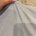 Nike women’s Light Gray top Photo 3