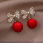 Red and Gold Bow Ornament Earrings Photo 1
