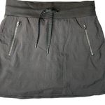 Athleta Women's Black Drawstring Zipper Pocket Trekkie North Skort Size 4 Photo 0